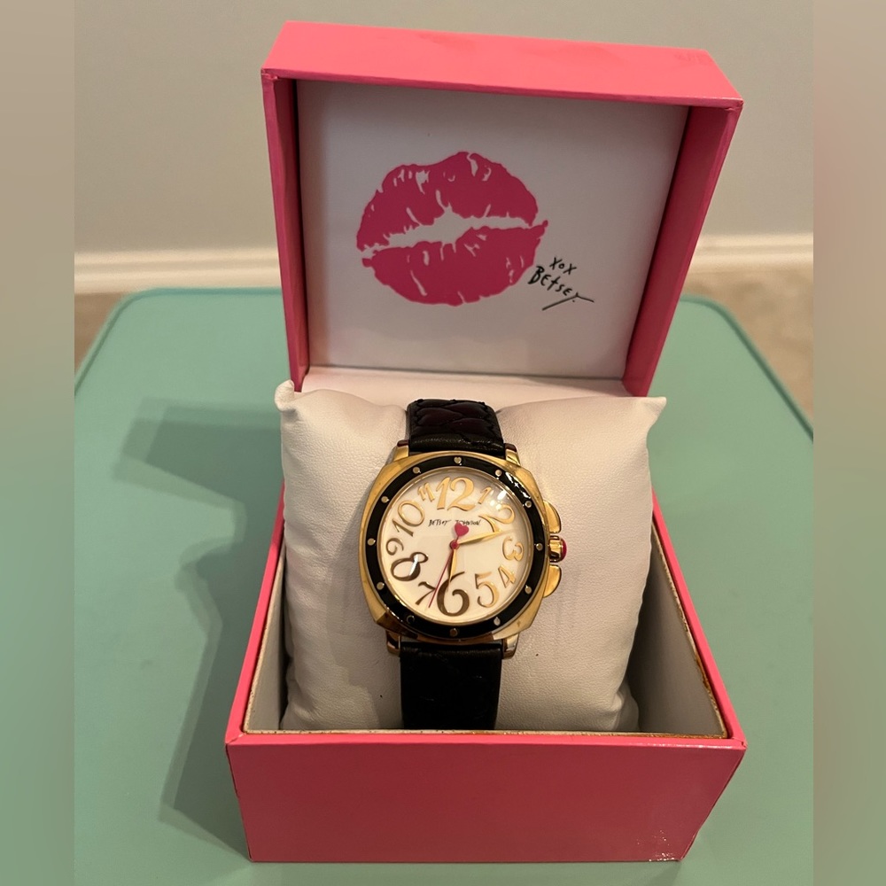 Betsey Johnson women’s wrist watch, black genuine leather